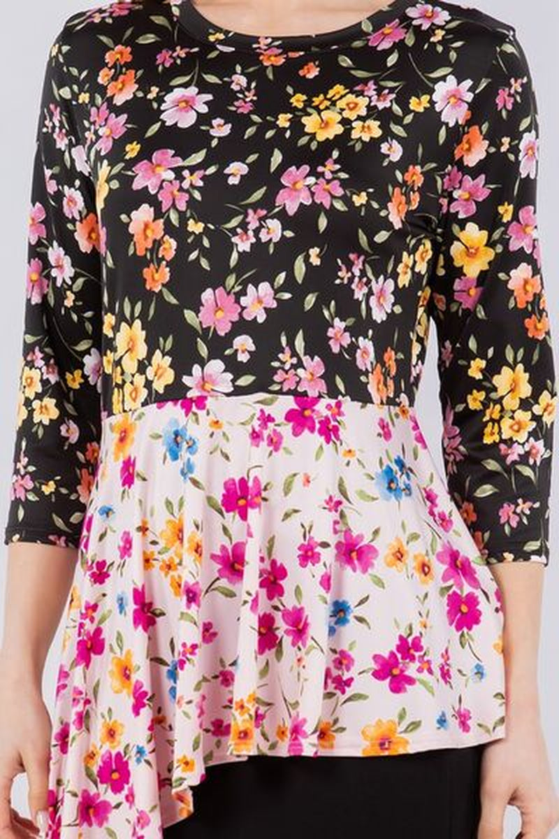 Celeste Full Size Floral Asymmetrical Hemline round Neck Top plus Size
